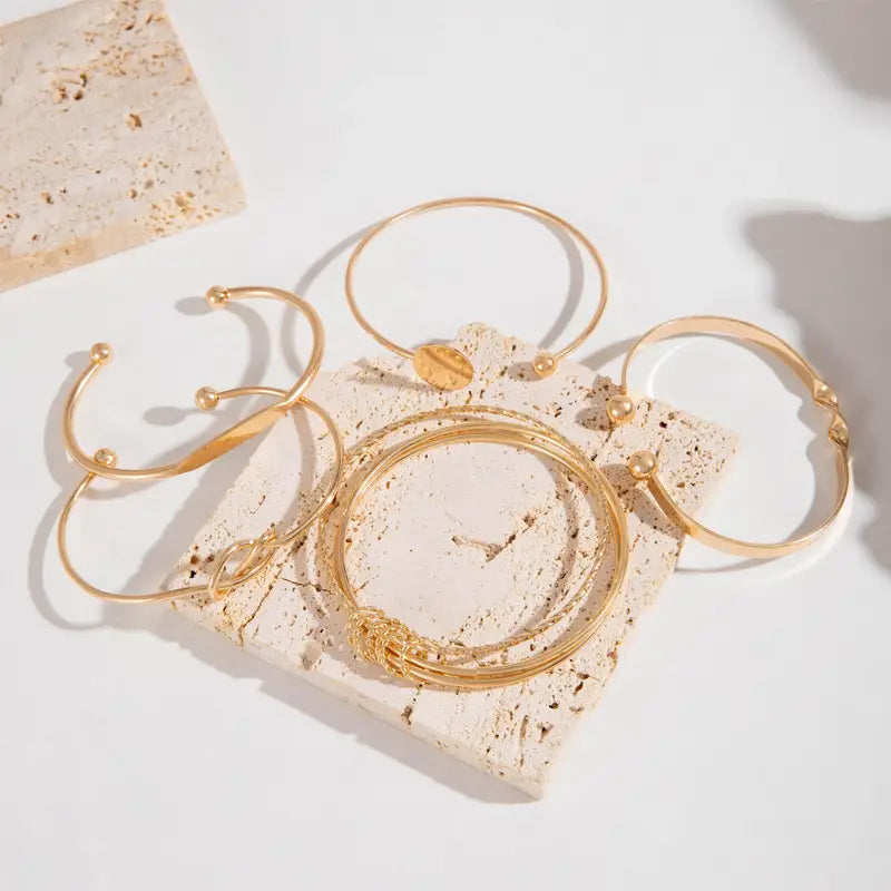 Knotted™ | Conjunto de Pulseras de Elegancia Dorada