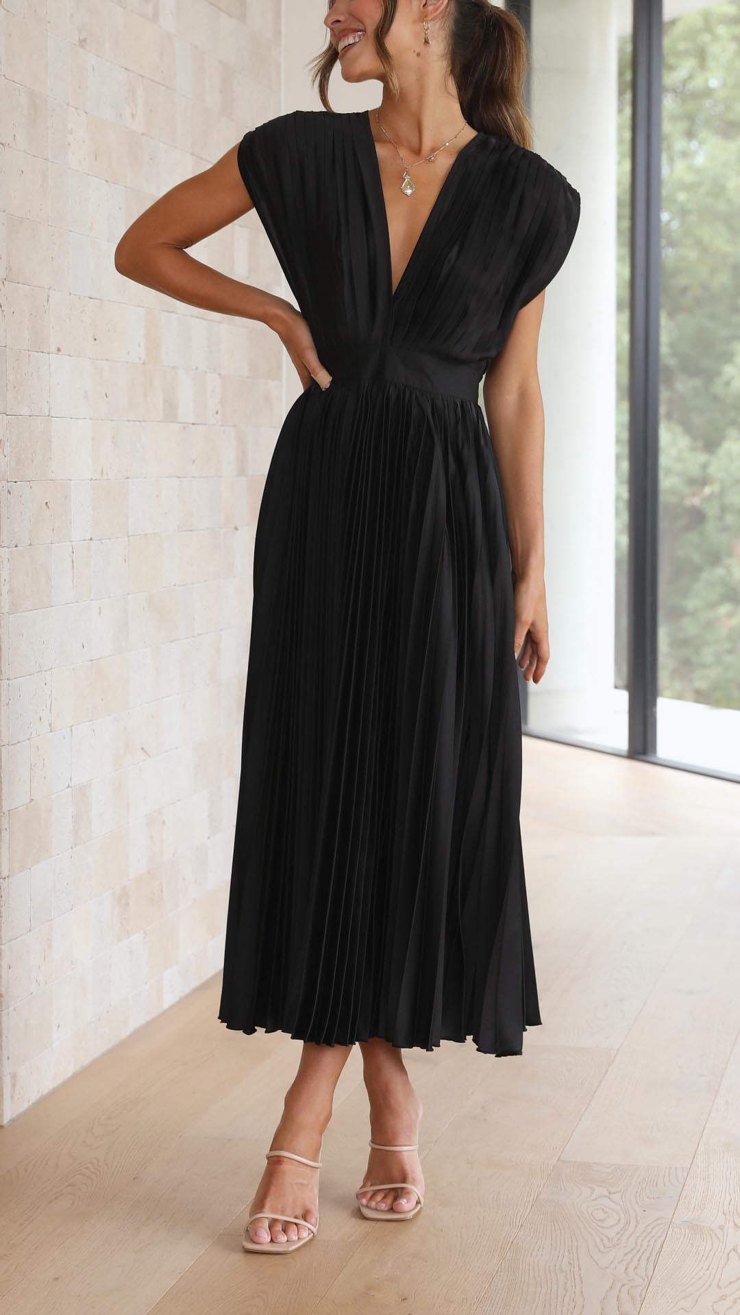 Alexis™ – a pleated v-neck dress