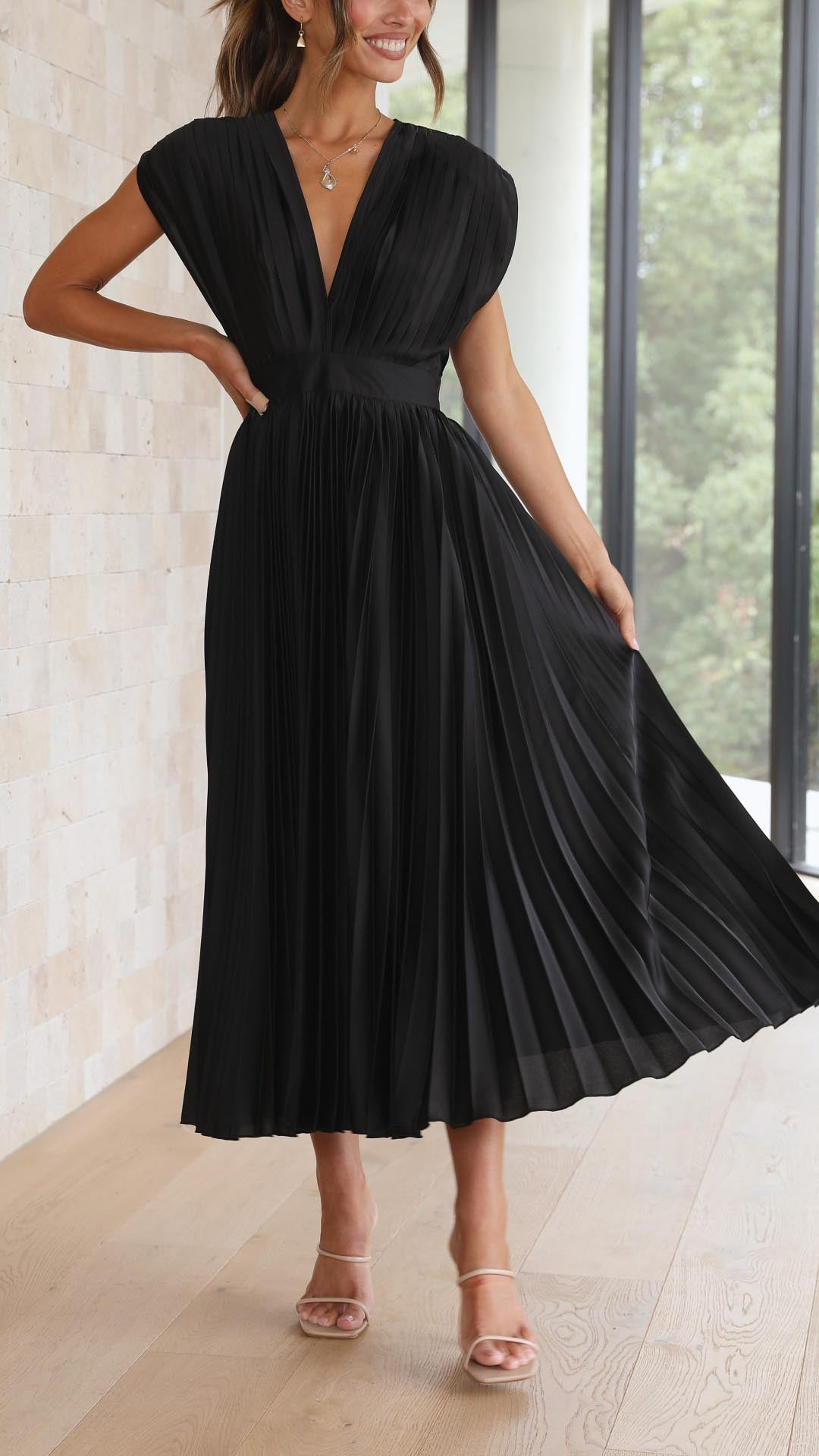 Alexis™ – a pleated v-neck dress