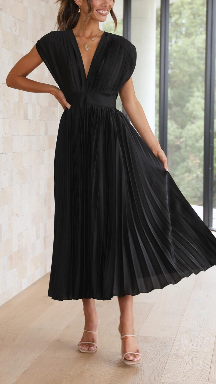 Alexis™ – a pleated v-neck dress
