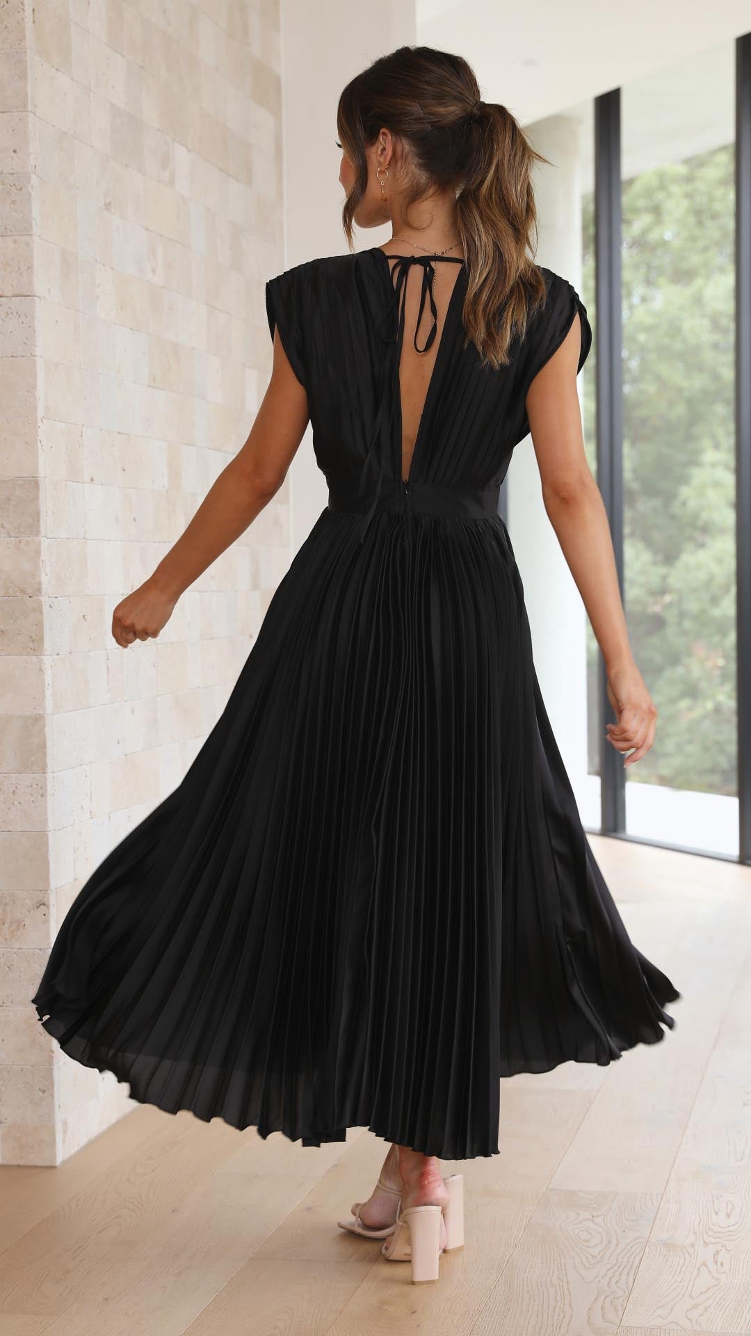 Alexis™ – a pleated v-neck dress