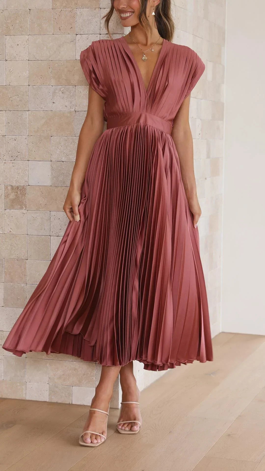 Alexis™ – a pleated v-neck dress