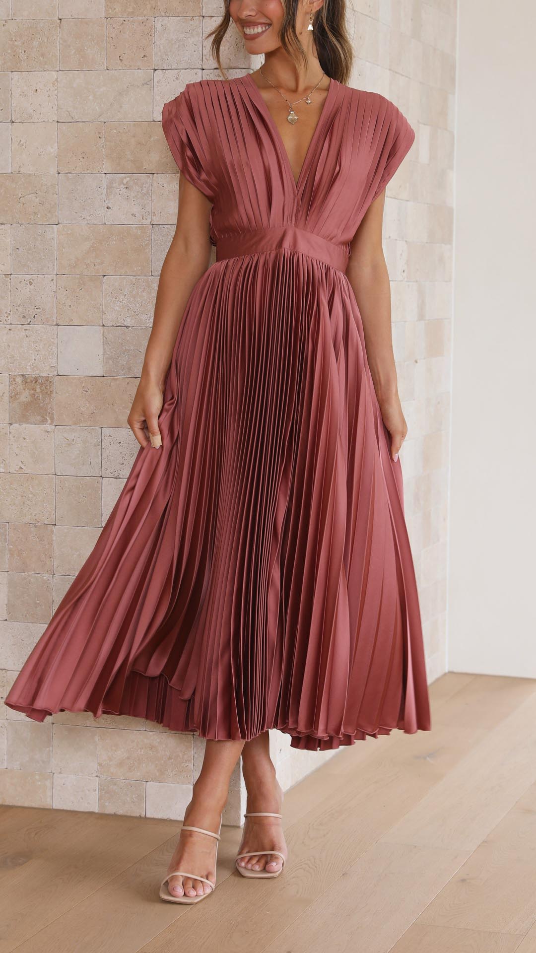 Alexis™ – a pleated v-neck dress