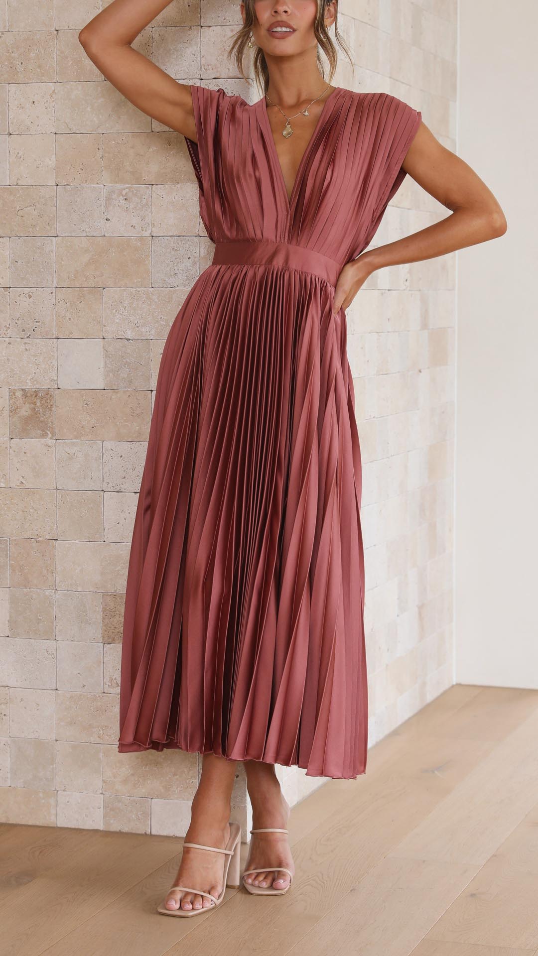 Alexis™ – a pleated v-neck dress